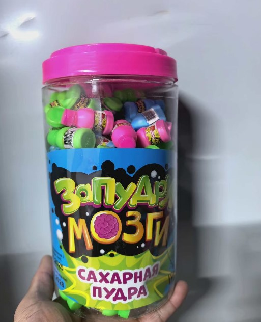 Miniature Soda Bottles Containing Fruit Soda Powder Candy - a Favorite Toy and Edible Candy for Kids.